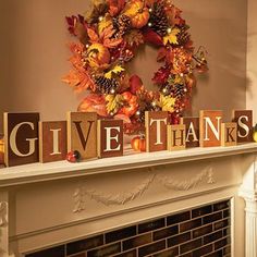 a decorated mantle with the words give thanks written on it