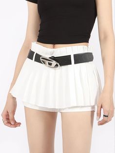 Make a confident statement with this Pleated Flare Mini Layered Skort Skirt, finely blending the sharpness of a mini with the unexpected twist of a skort.
Crafted with a keen eye for style, this piece features a crisp pleated design with a hidden shorts layer for added comfort and mobility. Its high waist cut and A-line silhouette are perfect for creating a figure-flattering look that moves seamlessly from day to night.
The versatile nature of the skort skirt makes it a staple addition to your w Style Pleated Skirt, Multiple Outfits, Skirt Y2k, Half Skirt, College Style, Urban Wear, College Fashion, Kpop Outfits, White Skirts