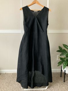 🌾 all linen dress made in Italy  🌾 Sleeveless and asymmetrical hem 🌾 Large Condition: very good pre worn condition with normal wear visible on fabric (ships clean and ready wear) Measurements: Shoulder to shoulder 14" Armpit to armpit 20" Waist side to side 20"  Length from shoulder to bottom hem 46" You can find more in the Dress Section at https://www.etsy.com/shop/CosmicCountryVintage?ref=shop_sections_curr&listing_id=1767019375§ion_id=50193350#items 90s Dress, Black Linen, Asymmetrical Hem, Linen Dress, Fit And Flare Dress, Asymmetric Hem, Flare Dress, Dress Making, Fit And Flare