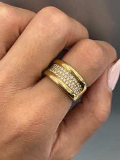 Statement Gold Chunky Ring, 0.5CT Natural Diamonds ring, 18k Yellow Gold, Vintage Jewelry, chunky ring, gold vintage ring, estate jewelry Jewelry Material: Yellow Gold 18k (the gold has been tested by a professional) Total Carat Weight: 0.50ct (Approx.) Total Metal Weight: 7.30g Size:7 US \ 17.35mm (inner diameter) Grading Results: Stone Type: Diamond Shape: Round Carat: 0.50ct (Approx.), Stones quantity:50 Color: E Clarity: VS1 So who is Nola? Nola is our creation and imagination. All the idea Gold Diamond Rings With Thick Band, Gold Diamond Ring With Brilliant Cut And Thick Band, Gold Diamond Thick Band Ring, Gold Diamond Wide Band Ring, Gold Wide Band Ring With Brilliant Cut For Promise, Gold Diamond Ring With Thick Band, Gold Wide Band Promise Ring, Yellow Gold Wide Band Promise Ring, Gold Wide Band Ring In Fine Jewelry Style