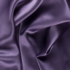 a close up view of purple fabric