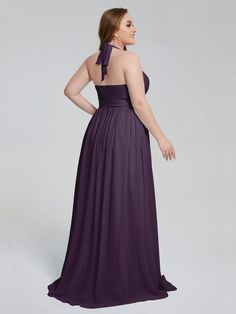 a woman in a long purple bridesmaid dress with an open back and bow at the neck