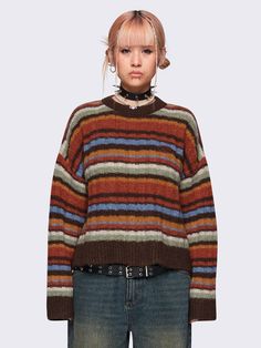 Get cozy with our multicolor striped knit sweater. This vintage-inspired grandpa sweater combines retro design with grandpacore style for a uniquely warm addition to your wardrobe. Find more jumpers at Minga London. Nancy Wheeler Striped Sweater, Gen X Soft Club, Striped Sweater Outfit, Minga London, Alt Clothing, Check Pants, Grandpa Core, Striped Knitted Sweater, Striped Knit Sweater