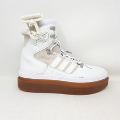 100% Authentic, brand new in original box Adidas x Ivy Park Super Sleek Boot  (GX2782) Women's shoes/boots Color: White / Core White / Off-White Women's Size: 10.5 US     (9 UK, 43 1/3 EUR, 27.5 CM) Items will ship on the first business day after receipt of payment with both tracking and insurance. Please allow up to 10 business days for delivery to the United States or Canada. Adidas Ivy Park, Adidas X Ivy Park, Adidas Super, Platform Shoe, White Shoes Sneakers, White Core, Exclusive Shoes, White Platform, Ivy Park