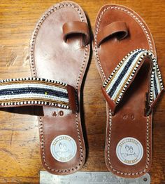 Hand Made Real Leather original genuine  Ladies sandals Brand New Famous CHAMPALI brand  Available in all popular sizes as below:- USA  UK  EURO 7  5  38         7.5  5.5  38.5 8  6  39         8.5  6.5  40   9  7  40.5 9.5  7.5  41         10  8  42         All in Stock 1st Class Package postage from UK FREE POSTAGE TO UK PLEASE MESSAGE US WITH WHAT SIZE YOU WANT AFTER BUYING HERE  THANK YOU! Leather Non-slip Slip-on Flip Flops, Non-slip Leather Toe Post Sandals, Brown Non-slip Flip Flops, Adjustable Open Toe Brown Slippers, Adjustable Brown Open Toe Slippers, Brown Adjustable Open Toe Slippers, Adjustable Leather Slip-on Slippers, Adjustable Leather Toe Ring Slip-on Sandals, Adjustable Leather Slip-on Toe Ring Sandals