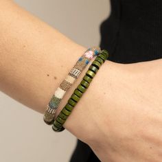 Pack Your Poncho Green A Strand Of Green Wooden Beads Joins A Colorful Textile Banded Cord Around The Wrist, Layering Into A Versatile And Seasonal Centerpiece Around The Wrist. Features An Adjustable Sliding Knot Closure. Sold As One Individual Uniquely Urban Unisex Bracelet. Brown Beaded Bracelet For Summer, Summer Brown Beaded Bracelets, Green Bohemian Beaded Everyday Bracelets, Everyday Bohemian Green Friendship Bracelets, Everyday Green Bohemian Friendship Bracelets, Earthy Green Beaded Bracelets For Everyday, Earthy Multicolor Beaded Bracelets For Beach, Bohemian Beige Beaded Bracelets For Summer, Bohemian Beige Beaded Bracelet For Summer