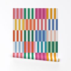 a multicolored striped paper on a white background