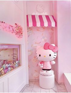 the hello kitty cafe is decorated in pink and white