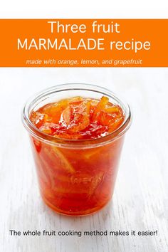 there is a small glass jar filled with marmalade