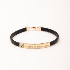 Cutout Initial Bracelet For Men, 14K 18K Real Gold Men Rubber Bracelet, Custom Engrave Name Bar Bracelet, Valentine's Day Gift For Boyfriend Material: Solid Gold, real gold (not gold-filled or gold-plated) Available Gold karat: 14 K (585), 18 K (750) Available gold color Yellow, rose, white Available rubber color: Black Available sizes: 6 mm x 40 mm, and 9 mm x 40 mm. The sizes may differ slightly due to handwork.   M o r e  *  F r o m  *  U s   Goldstore Jewelry - https://etsy.me/3gHtcrZ * Edit Modern Engraved Rose Gold Bracelets, Black Engraved Name Bracelet For Anniversary, Black 14k Gold Bracelet As Gift, Gold Leather Jubilee Bracelet, Elegant Black Engraved Name Bracelet, Classic Rose Gold Rectangular Bracelets, Engraved Black Bracelets For Anniversary, Modern Gold Bracelets For Father's Day, Gold Engraved Leather Bracelet Gift