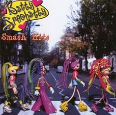 the cover art for the album smash hits, featuring three cartoon characters walking across a city street