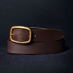 Handmade in our Toronto studio, Amara is a full grain leather belt that features a gold, rounded buckle. It can be worn as a waist belt around a dress or a regular belt around some high rise jeans. The meaning behind Amara, "Eternal," perfectly captures the essence of this versatile belt that you'll adore and cherish for a lifetime. One solid piece of full grain leather. No bonded belts, period. This results in a belt that minimizes stretch and will never break or crack at the holes. Crafted to Belt With Gold Buckle, Dress Belts, Brown Leather Dress, Waist Belts, Women's Belts, Dog Collars & Leashes, Dress Belt, Brown Leather Belt, Guitar Strap