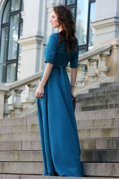 "Green and blue maxi dress with circle skirts. Golden color detail in neckline. Dress with lining, mid sleeves and zipper on the side. ➤ Features > dress lenght: 156 cm / 61,4\" > front bust pleats > mid sleeves > v neckline > pleats at skirt part > waistband ➤ Sizing My Size Guide in FAQ section below will help you define the perfect size match. The item can also be made according to your measurements - just message them to me. ➤ Delivery Your item is made-to-order and will be Solid Floor-length Maxi Dress For Wedding, Modest Solid Color Maxi Dress For Wedding, Modest Floor-length Bridesmaid Maxi Dress, Long Solid Color Dresses For Wedding, Solid Color Maxi Wedding Dress, Modest Blue Wedding Dress, Solid Color Full Length Wedding Dress, Modest Blue Floor-length Dress, Modest Long Maxi Dress For Wedding