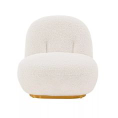 a white chair with gold legs on a white background in the shape of an egg