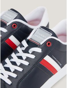 Tommy Hilfiger men's sneaker. Presenting our classic leather cupsole sneaker featuring our signature stripes with a generously padded footbed. A perfect partner to this season's jeans and chinos.  Material: 78% Leather (fwa), 22% Polyurethane. Casual Sneakers With Signature Stripes And Round Toe, Low-top Sneakers With Signature Stripes For Streetwear, Sporty Sneakers With Signature Stripes And Round Toe, Streetwear Sneakers With Signature Stripes And Round Toe, Sporty Sneakers With Signature Stripes For Streetwear, Sporty Streetwear Sneakers With Signature Stripes, Classic Leather Skate Shoes With Cushioned Footbed, Tommy Hilfiger Casual Sneakers With Cushioned Footbed, Casual Tommy Hilfiger Sneakers With Cushioned Footbed