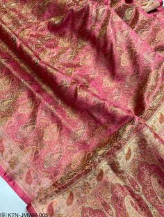 1.THIS IS BEAUTIFUL PURE Katan thread WIRK 3 PLY  JAMAVAR BANARASI SARI WITH RUNNING BLOUSE PIECE  2.THIS SARI IS 5.5 MT LENGTH  3.THIS IS A VERY ELEGANT LOOKING SARI FOR ALL OCCASIONS LIKE WEDDINGS AND OTHER FORMAL EVENTS  4.FALL N PICO IS COMPLIMENTARY  5.BLOUSE CAN BE MADE AS PER THE REQUIREMENTS OF THE CLIENTS WITH PROPER MEASUREMENTS.STICHING CHARGES WILL BE EXTRA  6.PLZ CHECK THE AVAILABILITY OF THE SARI BEFORE PLACING THE ORDER Pink Jamawar Blouse Piece For Eid, Pink Jamawar Dupatta For Traditional Ceremonies, Jamawar Shawl With Self Design For Eid, Eid Pink Jamawar Blouse Piece, Festival Jamawar Blouse Piece In Pink, Pink Jamawar Blouse Piece For Festivals, Bollywood Style Jamawar Fabric With Pallu Embroidery, Diwali Pink Jamawar Blouse Piece, Pink Jamawar Blouse Piece For Diwali