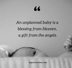 a baby laying on top of a bed next to a quote about being an unplanned baby