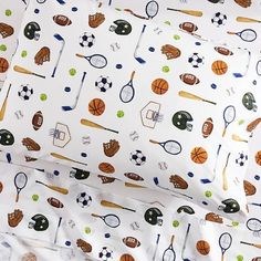 Game on! Little athletes will love this sheet set, arrayed with printed patches of vintage-inspired sporting gear. Tailored from pure cotton percale for natural softness and breathability. DETAILS THAT MATTER Made of 100% organic cotton percale. Digitally printed design. Fitted sheet has universal elastic (elastic around the entire edge) for a snug, secure fit. KEY PRODUCT POINTS Pottery Barn Kids exclusive. 200-thread count. Pillowcase has inside flap to keep pillow in place. Machine wash. Impo Boys Sports Bedroom Ideas, Sports Themed Bedroom, Boy Sports Bedroom, Kids Bed Sheets, Sports Bedding, Sports Quilts, Sports Bedroom, Jersey Quilt, Sport Bedroom