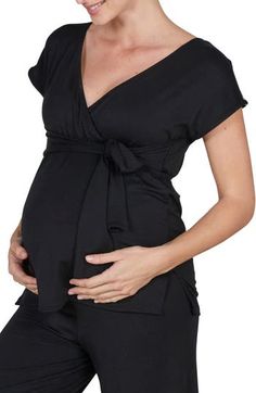 A soft, drapey pajama top is perfect for pregnancy and after with a surplice neckline for nursing. Surplice V-neck Short sleeves 96% lyocell, 4% elastane Machine wash, tumble dry Imported OEKO-TEX®–certified materials free of harmful substances Black V-neck Sleepwear For Relaxation, V-neck Wrap Top For Loungewear, Solid V-neck Sleep Tops, Black Short Sleeve Maternity Top, Black Pregnancy, Pregnancy Band, Maternity Nursing Pajamas, Nursing Pajamas, Surplice Neckline