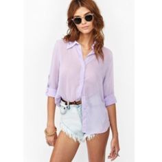 Nasty Gal Lilac Bianca Chiffon Blouse Size: S Color: Purple / Lilac / Mauve / Lavender Worn: purchased Dec '12. Never worn. No tags. Description: Super cute lilac chiffon blouse featuring a button-down front and textured detailing. Button tab at sleeve for easy rolling, loose fit. Perfect paired with shorts and bright shades. A Nasty Gal exclusive. Purchased: from Nasty Gal Material: 100% Polyester Item measurements: 26" length. Model wears size small. Nasty Gal Tops Blouses Awesome Blouse, Chiffon Fashion, Sheer Shirt, Purple Lilac, Best Wear, Chiffon Blouse, Passion For Fashion, Color Purple, Chic Style