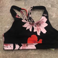 New With Tags, Very Flattering But Doesn’t Fit Me! Can Fit As A Small Also Spring Black Stretch Sports Bra, Spring Black Sports Bra, Black Sports Bra For Spring, Casual Black Sports Bra For Training, Spring Sports Bra In Black, Spring Season Black Activewear For Gym, Sporty Floral Print Activewear For Workout, Floral Print Athleisure Activewear For Sports, Floral Print Athletic Activewear For Sports