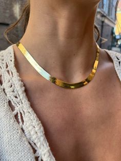 A thick, solid gold herringbone chain necklace. The perfect bold piece to elevate any look.-7mm width -length: 17" -19 grams *winter clear-out final sale Gold Herringbone Necklace, Gold Herringbone Chain, Herringbone Chain, Herringbone Necklace, Herringbone, Chains Necklace, Solid Gold, Chain Necklace, Yellow Gold