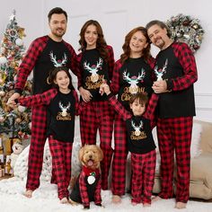 PatPat Merry Christmas Letter Antler Print Plaid Splice Matching Pajamas Sets for Family (Flame Resistant) (BoyGirlsWomenMen) is the PatPat Christmas hot selling round neck long sleeve baby men and women cute Christmas elk pajamas family set. ****The whole outfit is made of 96% Polyester, 4% Spandex. The fabric is soft and comfortable and will not cause any damage to the skin, so that children can wear it at ease and family members can feel more at ease. ****The top is black with a red and black Merry Christmas Letter, Matching Family Christmas Pjs, Red Plaid Pants, Family Matching Pajamas, Merry Christmas Family, Matching Family Christmas Pajamas, Family Pajama Sets, Matching Christmas Pajamas, Family Holiday Photos