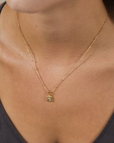 Brighten up everyday with the Cassia Pendant Necklace! A shining CZ stone in a simple pendant adds a touch of sparkle to any outfit. This chic accessory is sure to bring some shine to your day. Materials: 14K gold ﻿or﻿﻿ rhodium plated brass, cubic zirconia Features: Measures 16" with 2" extender, 1mm chain, 2mm beads, 0.6" pendant, 4.5mm CZ stone, Lead & Nickel free, lobster clasp Minimalist Gold Solitaire Necklace With Cubic Zirconia, Solitaire Necklace With Square Pendant For Gifting, Everyday Cubic Zirconia Diamond Pendant Necklace, Everyday Gold Solitaire Birthstone Necklace, Gold Solitaire Necklace With Birthstone For Everyday, Everyday Gold Solitaire Necklace With Single Diamond, Classic Gold Solitaire Necklace With Square Pendant, Everyday Cubic Zirconia Pendant Charm Necklace, Gold Solitaire Necklace With Birthstone In Cubic Zirconia