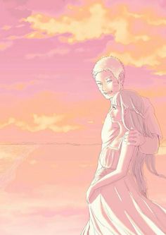 a man and woman standing in front of the ocean under a pink sky with clouds