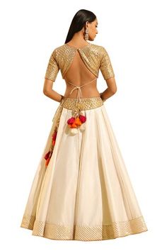 Ivory lehenga with placement hand embroidery using gota patti, dabka and zardozi. Paired with a blouse with all over hand embroidery in basra motifs and dupatta with all over flower vine, gota patti embroidery. - Aza Fashions Traditional Cream Lehenga With Gota Work, Traditional White Gown With Dori Work, White Tissue Silk Choli With Pallu Detail, White Tissue Silk Lehenga With Pallu, White Gown With Dori Work For Festive Occasion, Cream Choli For Reception And Festivals, Festive White Gown With Dori Work, Fitted White Gown With Dori Work, White Tissue Silk Choli With Pallu