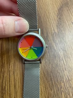 Brighten your day with this gorgeous rainbow multicolor watch by the Metropolitan Museum of Art. As the watch runs the colors change as the colored disc passes over them. Runs well. See the video! About 8 1/4" long at max, it can be made shorter. Slightly under 3/4" wide. The face of the watch (the multicolored part) is slightly over 1" wide. Marked Metropolitan Museum of Art with their logo. Marked all stainless steel, water resistant, Japan movement, made in China. The band is marked stainless steel as well. There are many scratches on the back of the watch & a couple minor scratches on the watch face. Please ask all questions prior to purchase as all sales are as is & are final. California residents: California Proposition 65 Warning: This product contains chemicals known to the State o Multicolor Round Watches As Gifts, Multicolor Round Watches For Gift, Multicolor Analog Watches As Gift, Multicolor Analog Watches For Gift, Gift Multicolor Analog Watches, Pride Gifts, How To Make Shorts, Watch Faces, Stainless Steel Watch