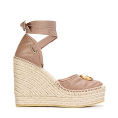 The Gucci collection is the pinnacle of Italian craftsmanship and attention to detail as seen in these dusty pink Leather platform espadrilles. Featuring an almond toe, a branded insole, a high wedge heel, a grosgrain lace-up closure and a gold-tone double G logo on the front.Lining: Leather 100%, Jute 100%Sole: Rubber 100%Outer: Leather 100% Chic Gucci Platform Wedge Sandals, Gucci Leather Wedge Sandals For Summer, Chic Gucci Summer Wedge Sandals, Gucci Wedge Sandals With Platform Heel, Espadrille High Heels With Wrapped Heel, Chic High Heel Espadrilles With Woven Sole, Gucci Summer Wedge Sandals, Gucci Summer Wedge Heel Sandals, Gucci Platform Wedge Sandals