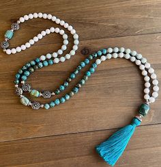 Limited Edition: 8mm Pepper Jasper, White Jade and Amazonite Mala Prayer Beads, with elaborate pewter and sterling plated markers offset by genuine turquoise, finished with Chrysocolla focal bead and natural cotton tassel. Adjustable Beaded Turquoise Agate Necklace, Turquoise Jade Beaded Bohemian Necklace, Bohemian Howlite Beaded Necklace With Gemstone Beads, Turquoise Amazonite Bead Jewelry, Turquoise Jewelry With 8mm Amazonite Beads, Bohemian Howlite Gemstone Beaded Necklaces, Turquoise Jade Bohemian Beaded Necklace, Bohemian Turquoise Jade Beaded Necklaces, Turquoise Amazonite Jewelry With 8mm Beads