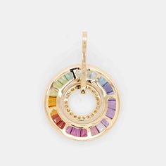 Indulge in the vibrant charm of the Multicolor Rainbow Circular Pendant, a celebration of unique individuality. Inspired by Rolex Daytona watches, this pendant's elegantly designed circular frame showcases carefully selected multicolored gemstones, creating a mesmerizing spectrum that enchants the eye. Multicolor Gemstone Round Pendant Jewelry, Multicolor Round Jewelry With Polished Finish, Multicolor Polished Round Jewelry, Luxury Multi-stone Round Pendant Jewelry, Modern Rainbow Round Jewelry, Modern Round Rainbow Jewelry, Multicolor Fine Jewelry With Polished Finish, Fine Jewelry With Polished Finish In Multicolor, Multicolor Polished Fine Jewelry