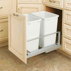 Upgrade your kitchen with the innovative pullout trash can solution Rev-A-Shelf's 5349 series provides. Tailored for under-cabinet use, this under-counter garbage bin seamlessly integrates into your kitchen, allowing for a tidy and organized space. With its discreet under-mount design, this kitchen hideaway optimizes space, ensuring your counters remain clutter-free and functional. Experience the convenience of effortless waste disposal with the smooth gliding and soft-closing feature, making ki Pull Out Trash Cans, Kitchen Base Cabinets, Rev A Shelf, Waste Container, Kitchen Trash Cans, Trash And Recycling Bin, Recycle Trash, Cabinets Organization, Base Cabinets