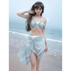 Swimwear that makes you look like a fantastic goddess with a mysterious shine. The ruffles and elegant drapes create a romantic atmosphere. Decorative chains are attached to the waist and chest. 
 
 
 
 Tops 
 Bottoms 
 
 
 Size 
 
 S size
 
 Tops
 
 Length: 29.5cm 
 Bust: 76cm 
 Waist: 65cm 
 
 
 Bottoms
 
 Total length: 70cm 
 Waist: 64cm 
 Hip: 82cm 
 
 
 
 
 M size
 
 Tops 
 
 Length: 29.5cm 
 Bust: 80cm 
 Waist: 69cm 
 
 Bottoms 
 
 Total length: 72cm 
 Waist: 68cm 
 Hip: 86cm 
 
 
 
 L siz Beach Summer Outfits, Fairy Goddess, Kawaii Swimsuit, Without Bra, Classic Lolita, Japanese Sweet, Chain Top, Cute Swimsuits, Blue Swimsuit