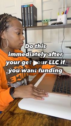 a woman sitting in front of a laptop computer with the caption do this immediately after your get & you're lic if you want funding