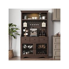 a wooden hutch with wine glasses and bottles on the top, next to a potted plant