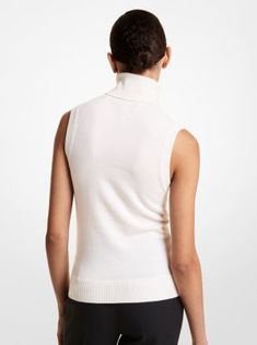 Crafted from luxe Italian cashmere this sleeveless sweater is a wardrobe must-have that will stand the test of time. The lightly ribbed trim adds subtle texture while the figure-flattering fit ensures easy layering. Wear it with trousers in a complementary hue. Luxury Sleeveless Cotton Sweater Vest, Fitted Sleeveless Cashmere Vest, Elegant White Cashmere Turtleneck, Luxury Sleeveless Wool Sweater, Fitted Cashmere V-neck Sweater Vest, Sleeveless Puffer, Sleeveless Turtleneck, Cashmere Turtleneck, Sleeveless Jacket