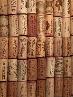 many wine corks stacked on top of each other