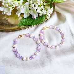 Purple Pearl Bracelet - Baroque Pearl Bracelet - Purple Bracelet - Violet - Lilac - Pastel Pearl Bracelet Item Details: ⭐ This bracelet is so simple yet on point, in trend and chic. It's made with pastel purple jade beads and baroque pearls. Another option is made with beautiful shiny purple glass beads. ⭐ This bracelet is 18cm long. You can request your own desired length if this is not the length you like.  ⭐ The bracelet is made with 18k gold-plated gold chain 💻😊 P.S. If this length is not Lavender Beaded Bracelets With Round Beads As Gift, Lavender Bracelets With Spacer Beads For Gift, Lavender Bracelets With Spacer Beads As Gift, Lavender Beaded Bracelet Jewelry, Lavender Beaded Crystal Bracelet As A Gift, Lavender Beaded Crystal Bracelet For Gifts, Lavender Bracelets With Colorful Beads, Lavender Hand-strung Bracelets With Round Beads, Hand-strung Lavender Round Bead Bracelets