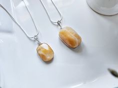 These beautiful sterling necklaces come feature a stunning faceted Orange Calcite gemstone! Orange Calcite is a wonderful crystal for helping you through persistent issues by getting your energy moving and encouraging you to take a new look at accomplishing your goals. It can be used for healing emotional issues related to shame, shyness, and social phobias. Orange Calcite can also be used to move energy through the body and supports the sacral chakra, encouraging creativity and playfulness! $28 Crystal Uses, Orange Calcite, Sterling Necklaces, Sacral Chakra, Sound Healing, Crystal Art, Jewelry Art, Chakra, New Look