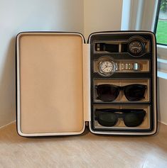 Our full grain leather watch and sunglass storage case is not only functional - it's absolutely gorgeous! It's perfect when travelling, or even to keep things organized, safe and clean around the house. It can fit up to a 50mm watch and your largest pair of sunglasses. Allow us to personalize it and truly make it the perfect gift! Sunglass Storage, Bridesmaid Cosmetic Bag, Travel Gift Ideas, Clothing Board, Sunglasses Storage, Closet Decor, Creative Products, Awesome Gifts, Monogram Jewelry