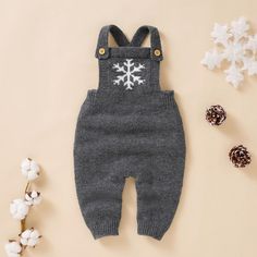 These adorable knit jumpsuits area great combination of warm, cozy and cute all packed in one. Comes in 3 colors. Lay flat to dry Imported CLEARANCE ITEM - LAST FEW IN STOCK! Winter Cotton Onesie, Cozy Solid Onesie For Winter, Cozy Solid Color Onesie For Winter, Gray Cotton Onesie For Winter, Winter Knitted Long Sleeve Onesie, Gray Long Sleeve Jumpsuits And Rompers For Winter, Cotton Long Sleeve Overalls For Winter, Gray Winter Loungewear Jumpsuits And Rompers, Winter Cotton Jumpsuits And Rompers For Loungewear