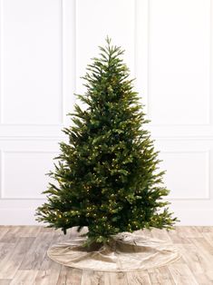 Bring a hint of luxury and traditional Christmas charm to your home with this Nature Spruce LED Christmas Tree. This full, green tree is made with nature spruce, is dimmable with the included dimmer, and is lit with warm white rice LED lights for a unique festive look. As a finishing touch, you can choose from 7.5ft, 9ft, and 12ft tall varieties. Make this holiday season one to remember with this sophisticated statement piece. Living Room Halloween Decor, Spruce Christmas Tree, Flocked Trees, Pine Christmas Tree, Nightmare Before Christmas Halloween, Mickey Mouse Halloween, Lampoons Christmas, Led Christmas Tree, National Lampoons Christmas