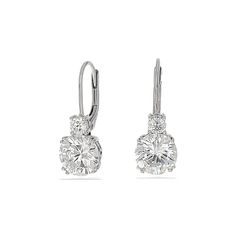 Simplicity stuns in these classic round brilliant CZ lever back earrings. Sparkling from miles away, these elegant earrings are sure to impress and delight. Details:• Round Brilliant Cubic Zirconia Stones• Rhodium Plated or 18k Yellow Gold Plated Sterling Silver• Lever-back Closure • Length: 22mm• Width: 8mm Dazzling Brilliant Cut Drop Earrings, Cluster Drop Earrings With Prong Setting In Cubic Zirconia, Cubic Zirconia Brilliant Cut Diamond Drop Earrings, Elegant Round Cluster Cubic Zirconia Earrings, Cubic Zirconia Cluster Drop Earrings, Elegant Round Cluster Earrings With Diamond Accents, Brilliant Cut Sterling Silver Cluster Drop Earrings, Elegant Formal Diamond Earrings With Round Stone, Sterling Silver Cluster Earrings With Brilliant Cut