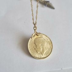 "Beautiful solid gold coin pendant necklace, romantic antique-style jewelry for women in solid 9k and 14k yellow gold. This unique necklace is solid gold, and has a Moroccan coin as a pendant. The coin in the pendant is a replica that I made of an original Moroccan coin I cast into gold. It is available in 9k and 14k yellow gold, and in 16\" or 18\" length. This necklace is simply timeless and breathtaking. You can wear it as a single item or layered with other necklaces for a total boho-chic lo Gold Coin Pendant Necklace Stamped 14k, Yellow Gold Coin Pendant Necklace, Gold Sterling Silver Necklaces With Vintage Charm, Classic 14k Gold Coin Necklace, Classic Gold Pendant Coin Necklace, Classic Gold Medallion Necklace With Coin Pendant, Classic Gold Coin Necklace With Round Pendant, Classic Gold Plated Coin Necklace With Round Pendant, Yellow Gold Brass Coin Necklace As Gift