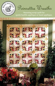 the cover of a quilt book with red and yellow flowers in front of a window