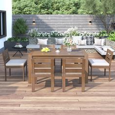 a wooden table sitting on top of a hard wood floor