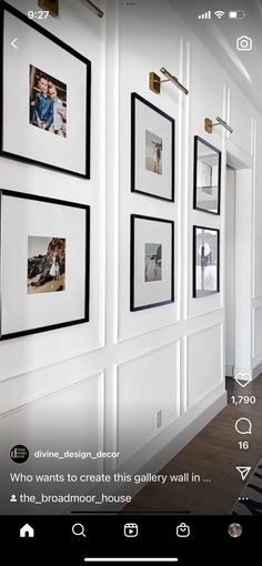 a room with white walls and pictures on the wall